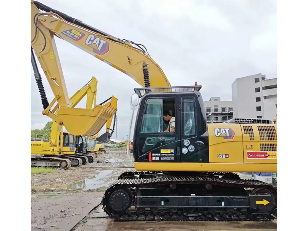 รถแม็คโคร CAT320GX